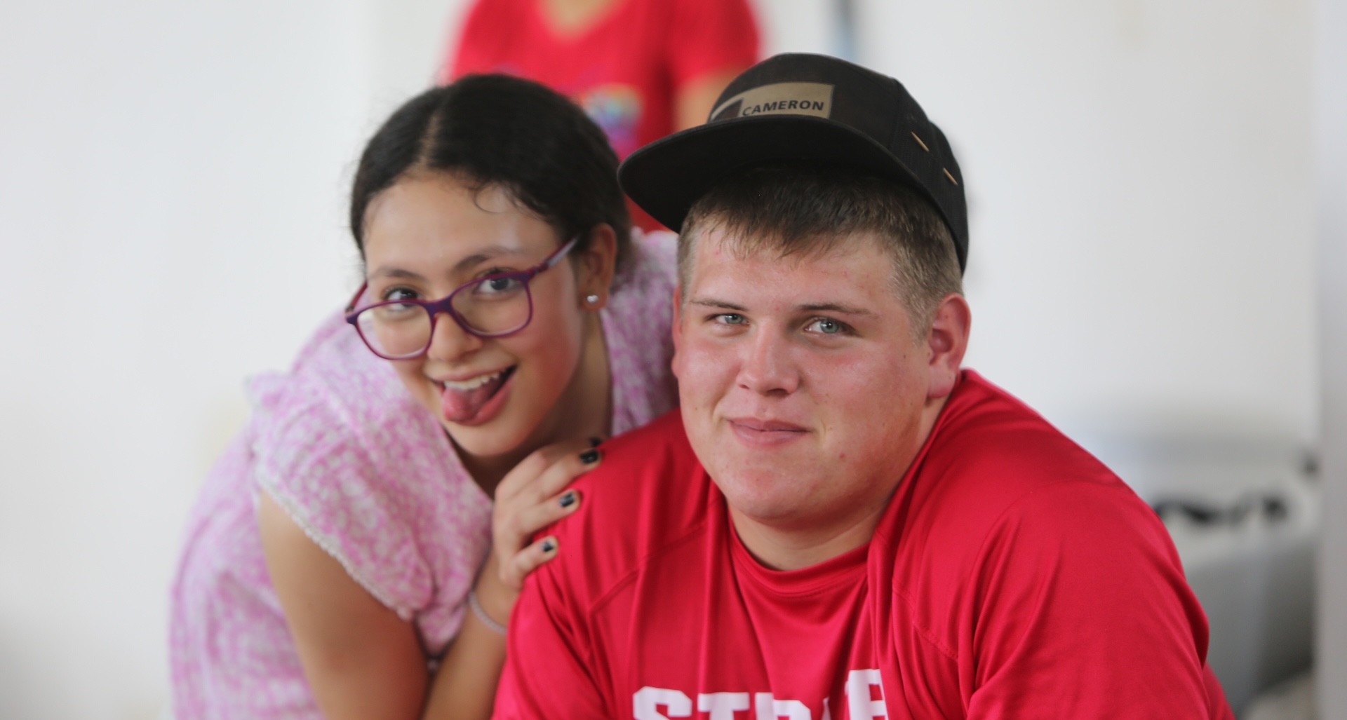photo of teens smiling at the camera