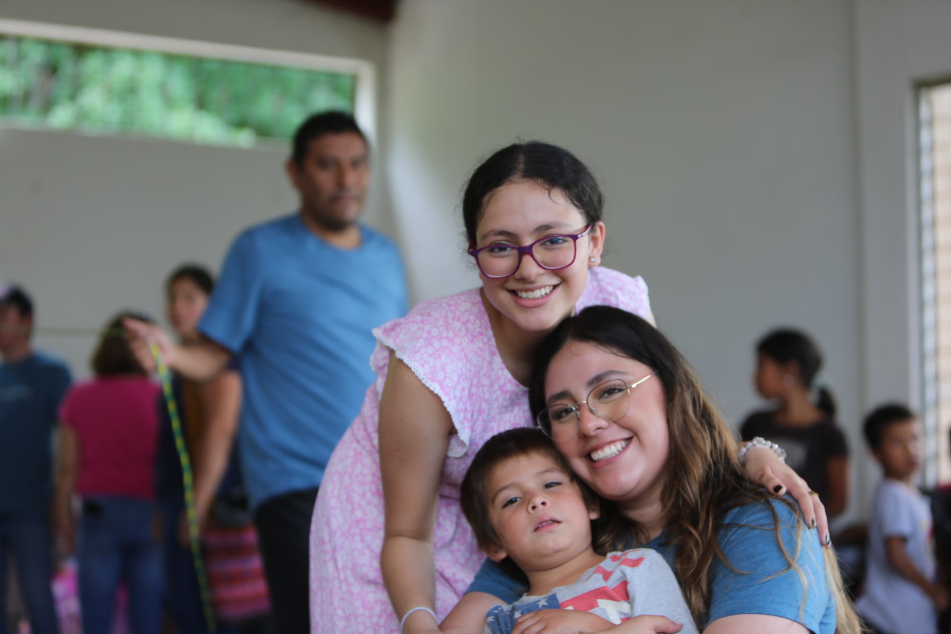 photo of people hugging and smiling